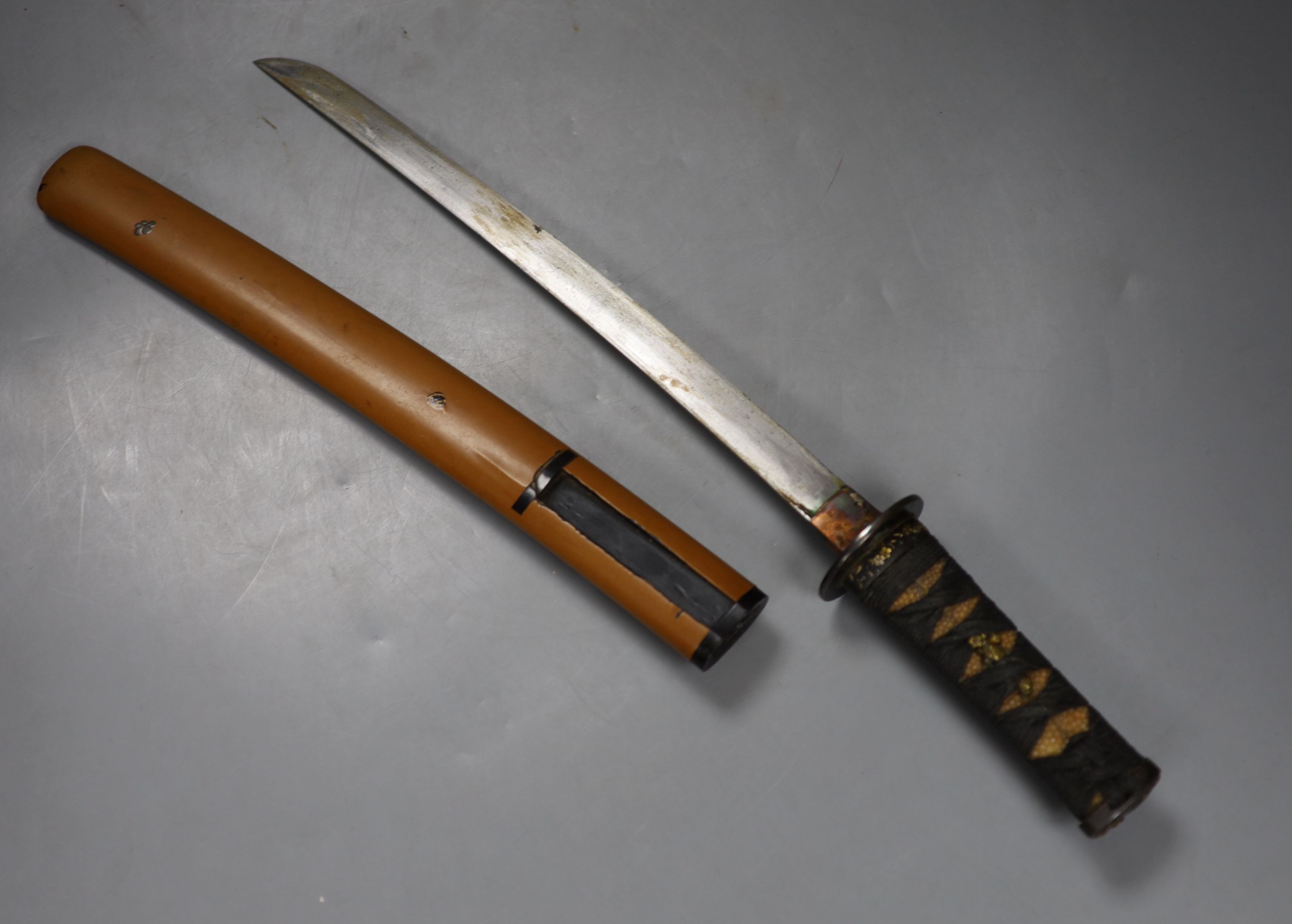 A Japanese tanto and scabbard, with associated fittings. Circa 1900